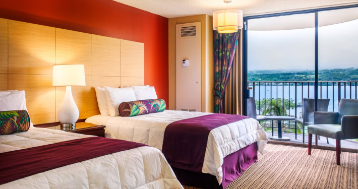 Hilo Hawaiian Ocean View Room with two beds and balcony seating