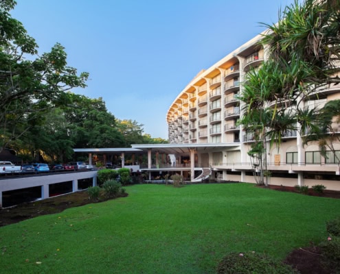 Hilo Hawaiian Hotel Exterior with grassy lawn