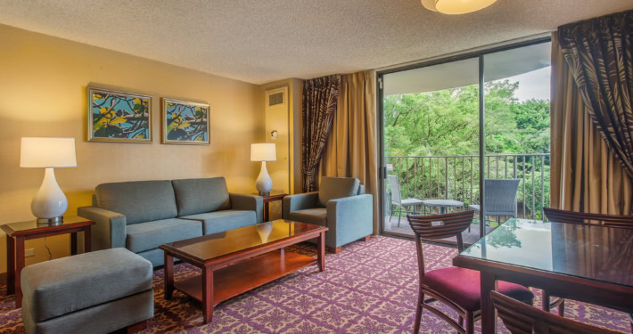 Hilo Hawaiian Hotel Junior Suite with separate seating area and a dining area