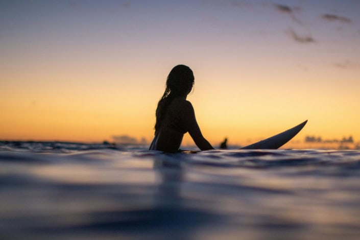 Surfer on a surfboard waiting for a wave